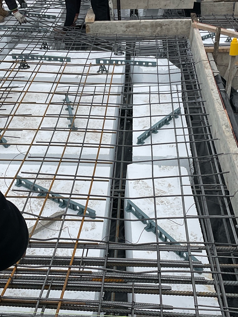 Internal slab beams obstructed and not running continuous, recorded during a slab pre-pour inspection in Donnybrook